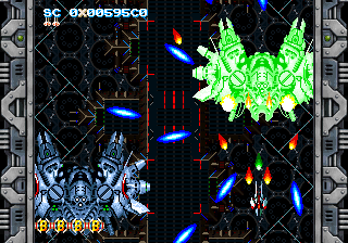 The stage 1 boss fight, large green and silver ships and blue bullets